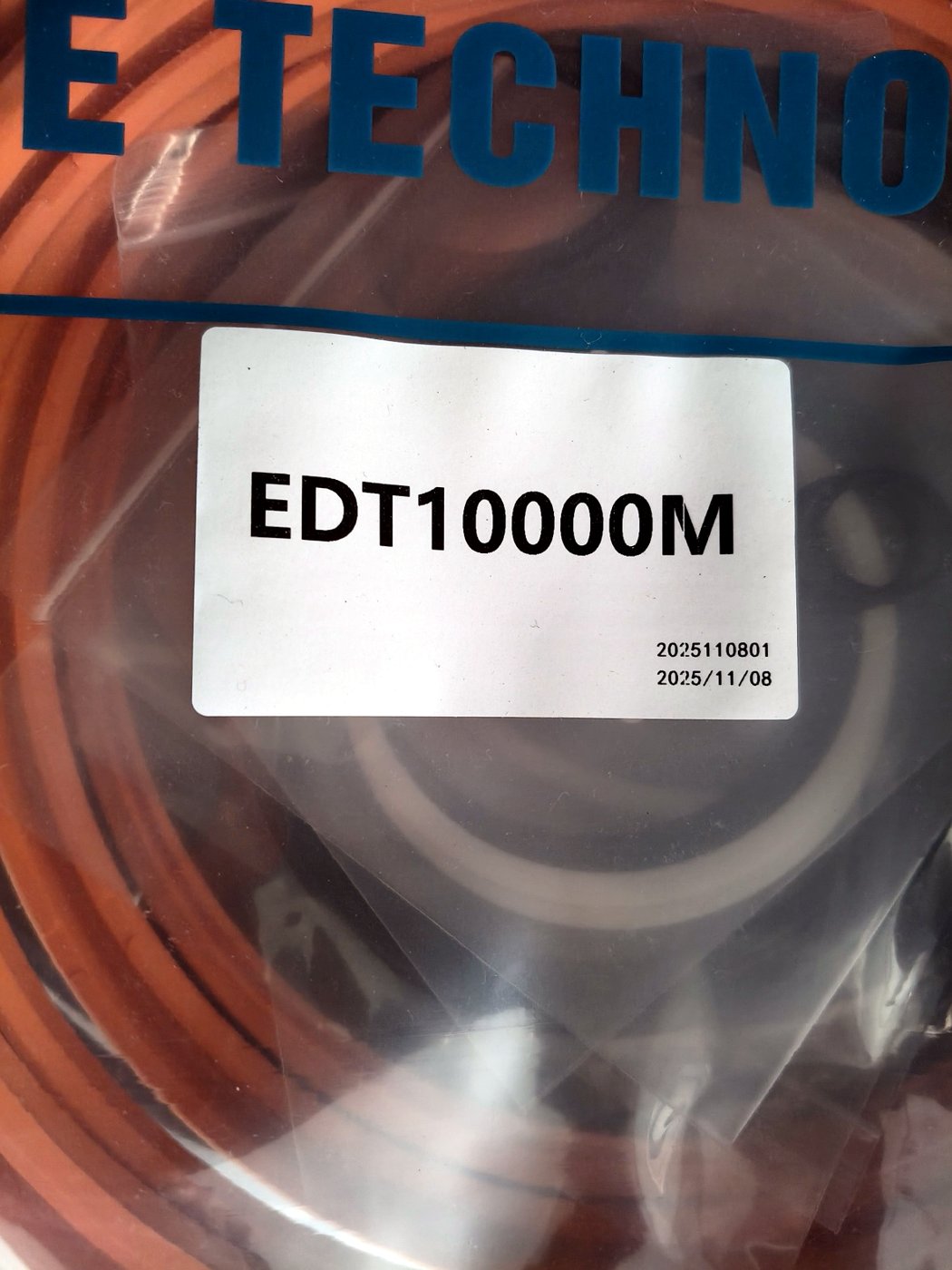 Close-up of a kit label showing the model EDT10000M and batch code